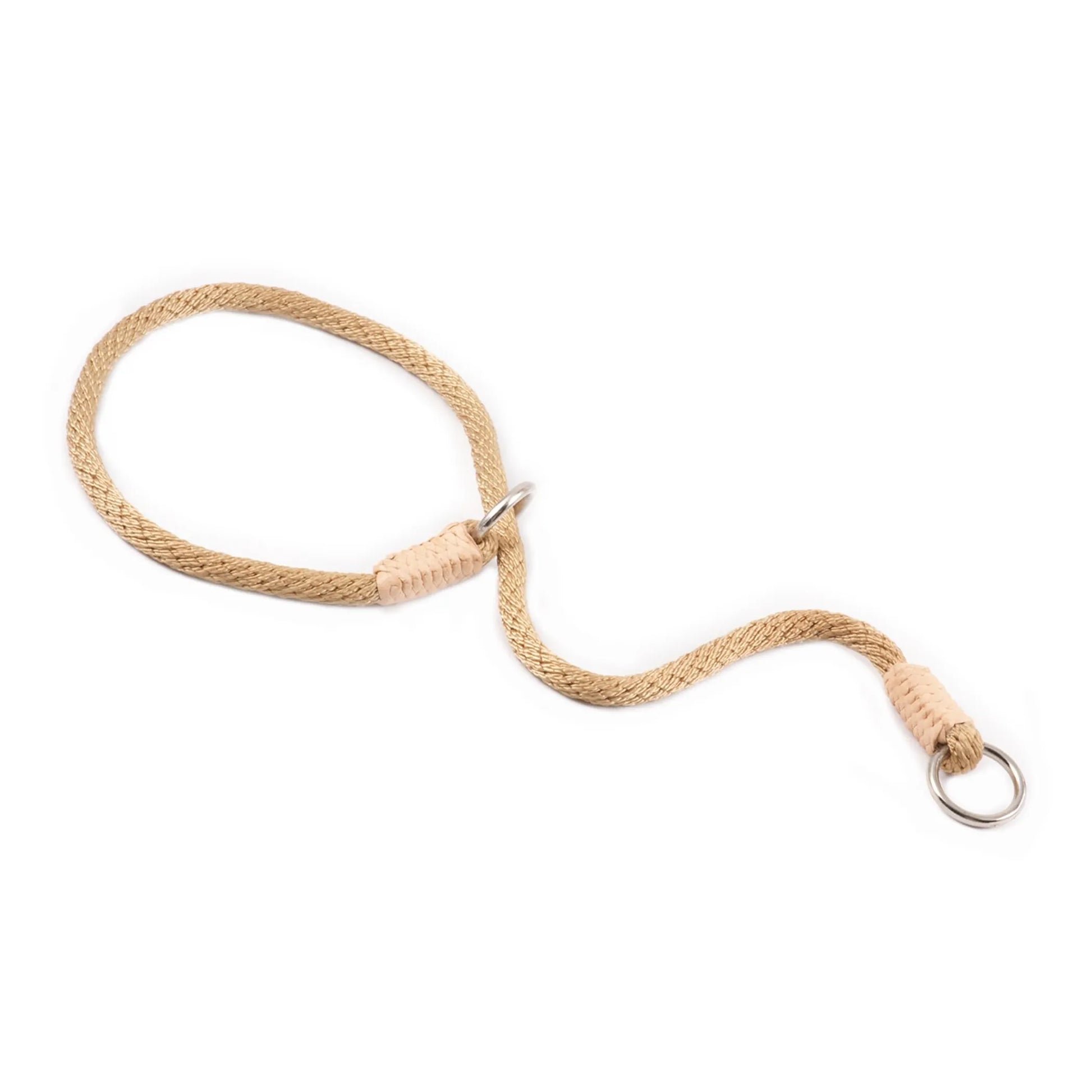 Beige dog leash with metal clip on a white background