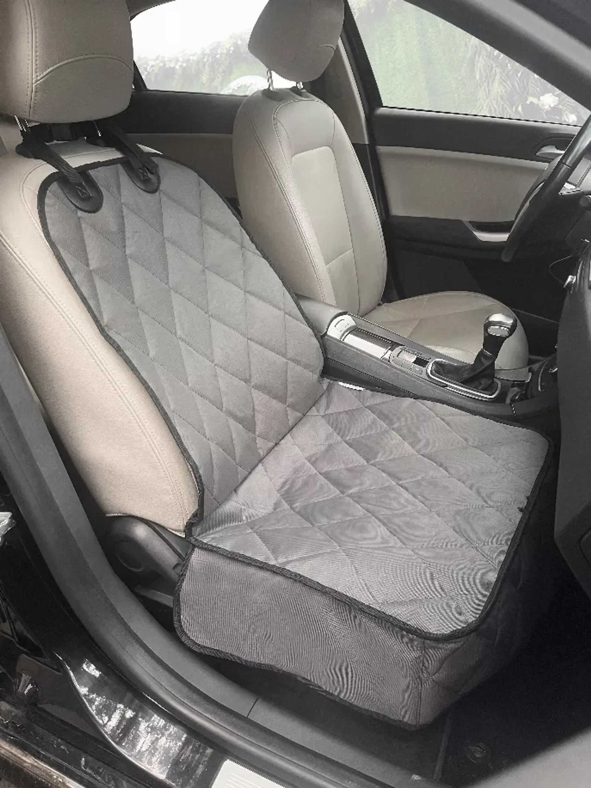 Car seat cover on a car seat with a quilted pattern