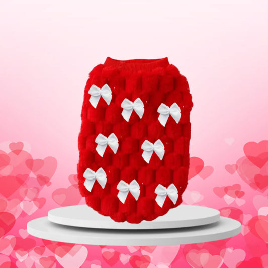 Red textured product with white bows on a pink heart-patterned background